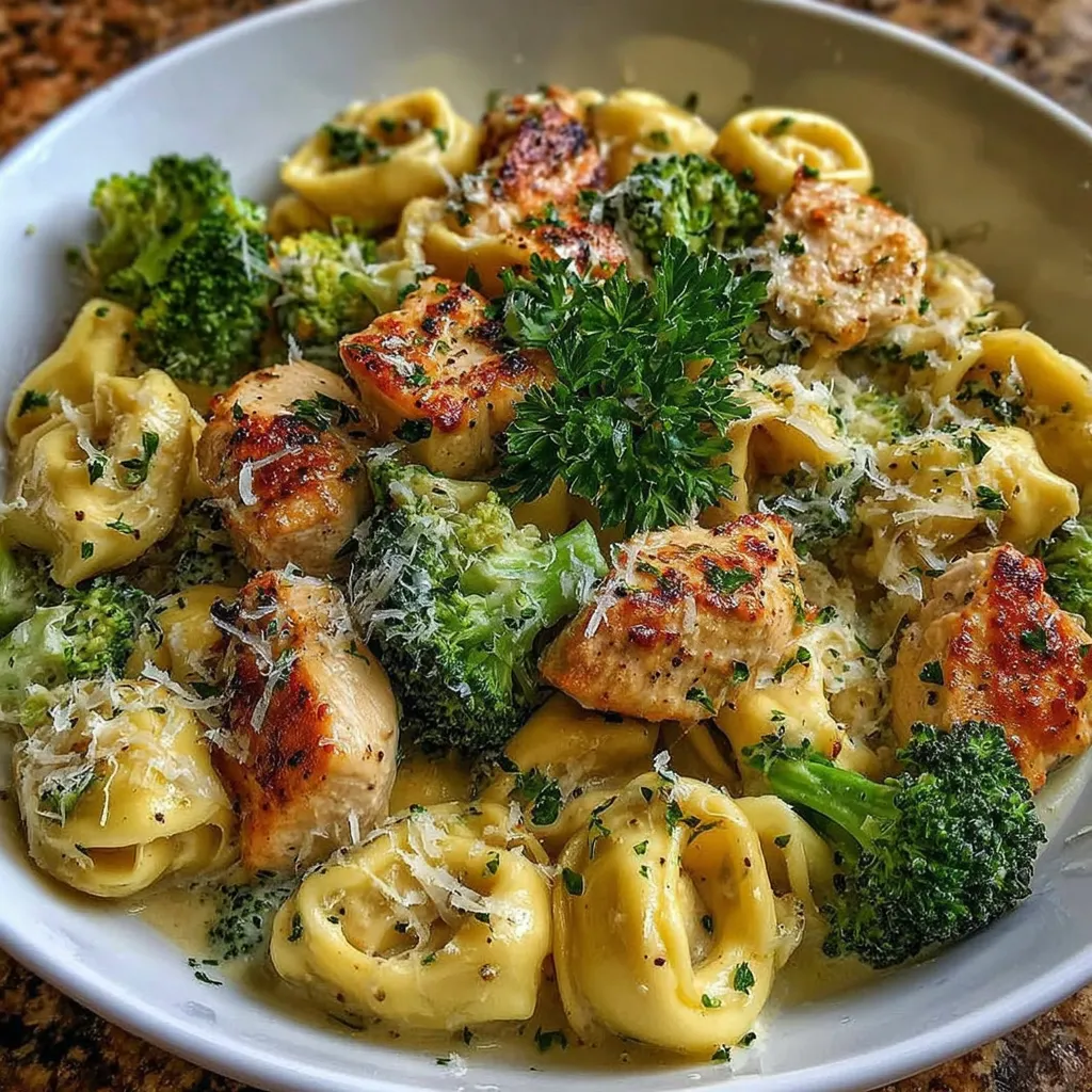 A bowl of garlic Parmesan chicken tortellini.