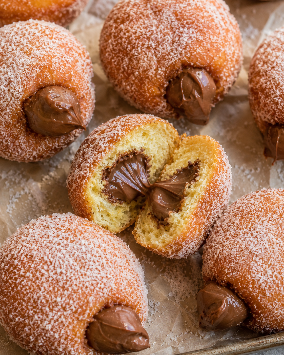 Nutella donuts with chocolate drizzle.