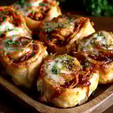 A plate of BBQ chicken roll-ups.