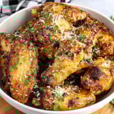 A bowl of garlic Parmesan wings air fryer.