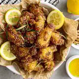 A plate of honey lemon pepper wings.