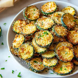 A plate of baked zucchini chips.