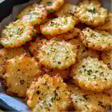 A plate of garlic ritz snacks.