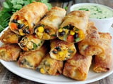 A plate of spicy chicken egg rolls.