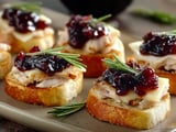 Turkey brie bites on a plate.