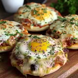 English muffin breakfast pizza with eggs and cheese.