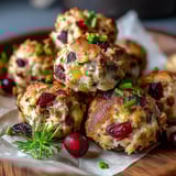 A plate of cranberry and turkey stuffing balls.