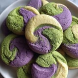 A plate of green and purple cookies.