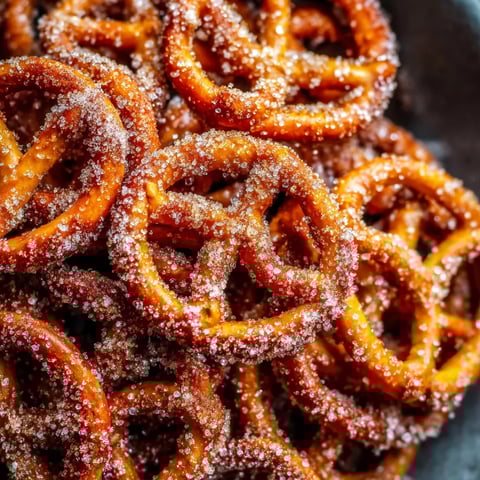 A bowl of cinnamon sugar pretzels.